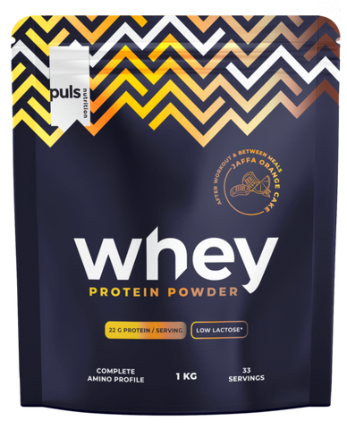 PULS NUTRITION Whey pulveris ar Jaffa apelsīnu kūkas garšu, 1000 g, zems laktozi